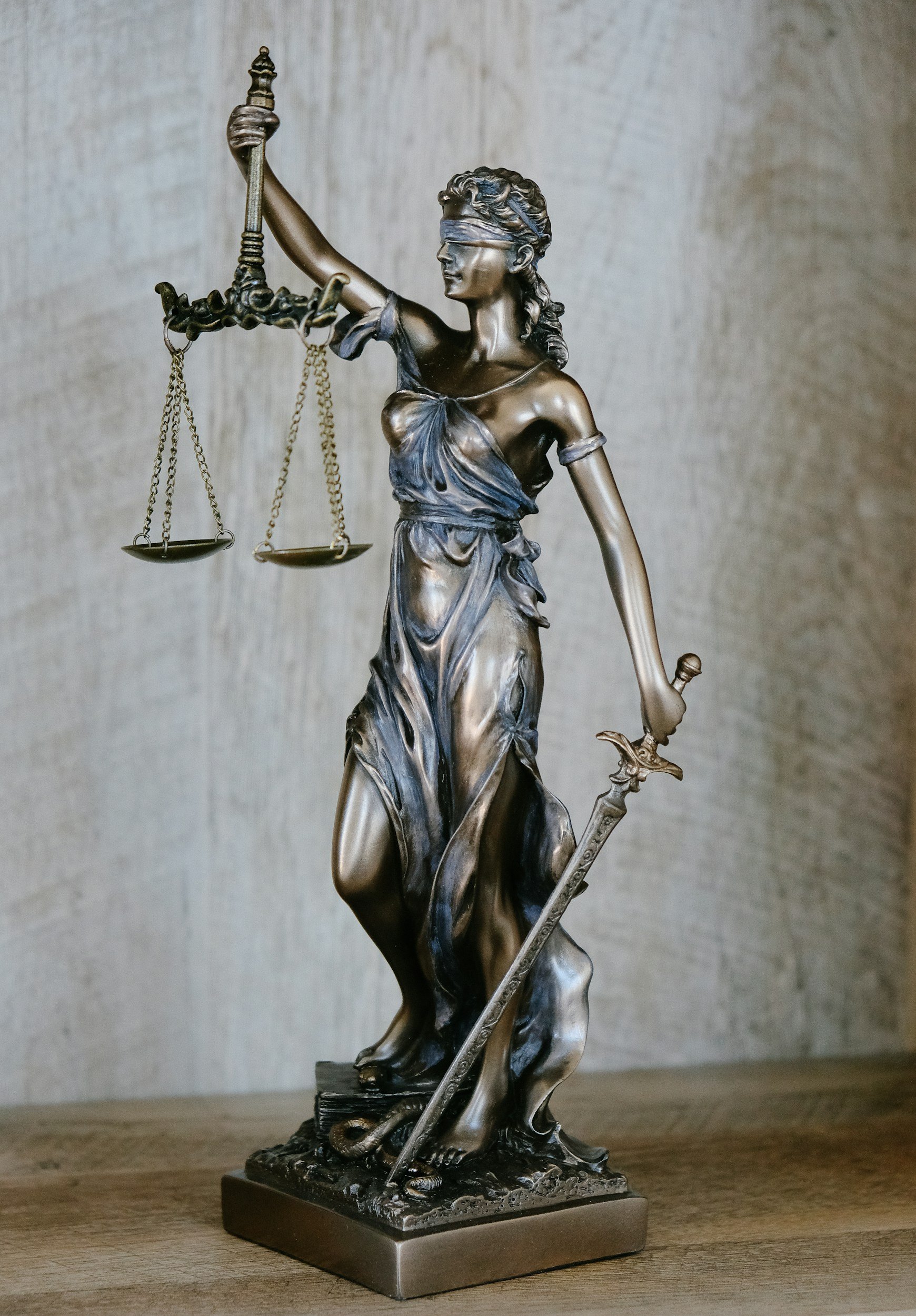 Statue of Lady Justice with scales and sword